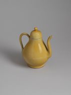 Yellow-glazed porcelain ewer and cover