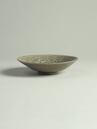 4. Green-glazed stoneware dish