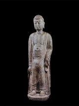 View Limestone figure of a standing Buddha