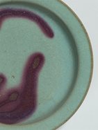 11. Blue-glazed splashed stoneware dish