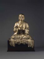 Gilt lacquered bronze figure of a Luohan