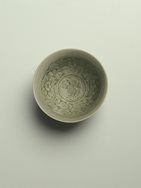 2. Green-glazed stoneware bowl
