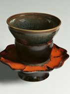 7. Glazed stoneware ‘hare’s fur’ tea-bowl and a lacquer cup stand