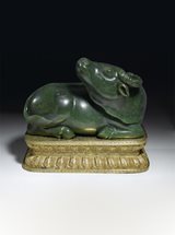 View Imperial spinach-green jade water buffalo, on gilt-bronze stand