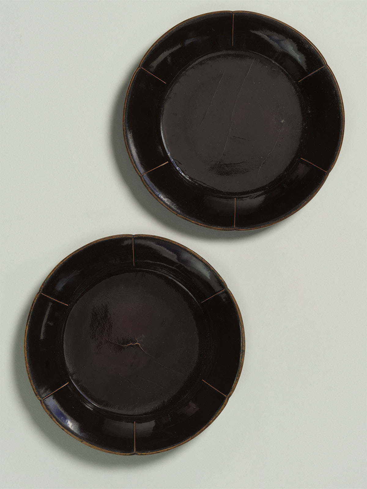 5. Pair of brown lacquer foliate dishes