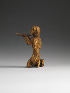 Gold kneeling figure