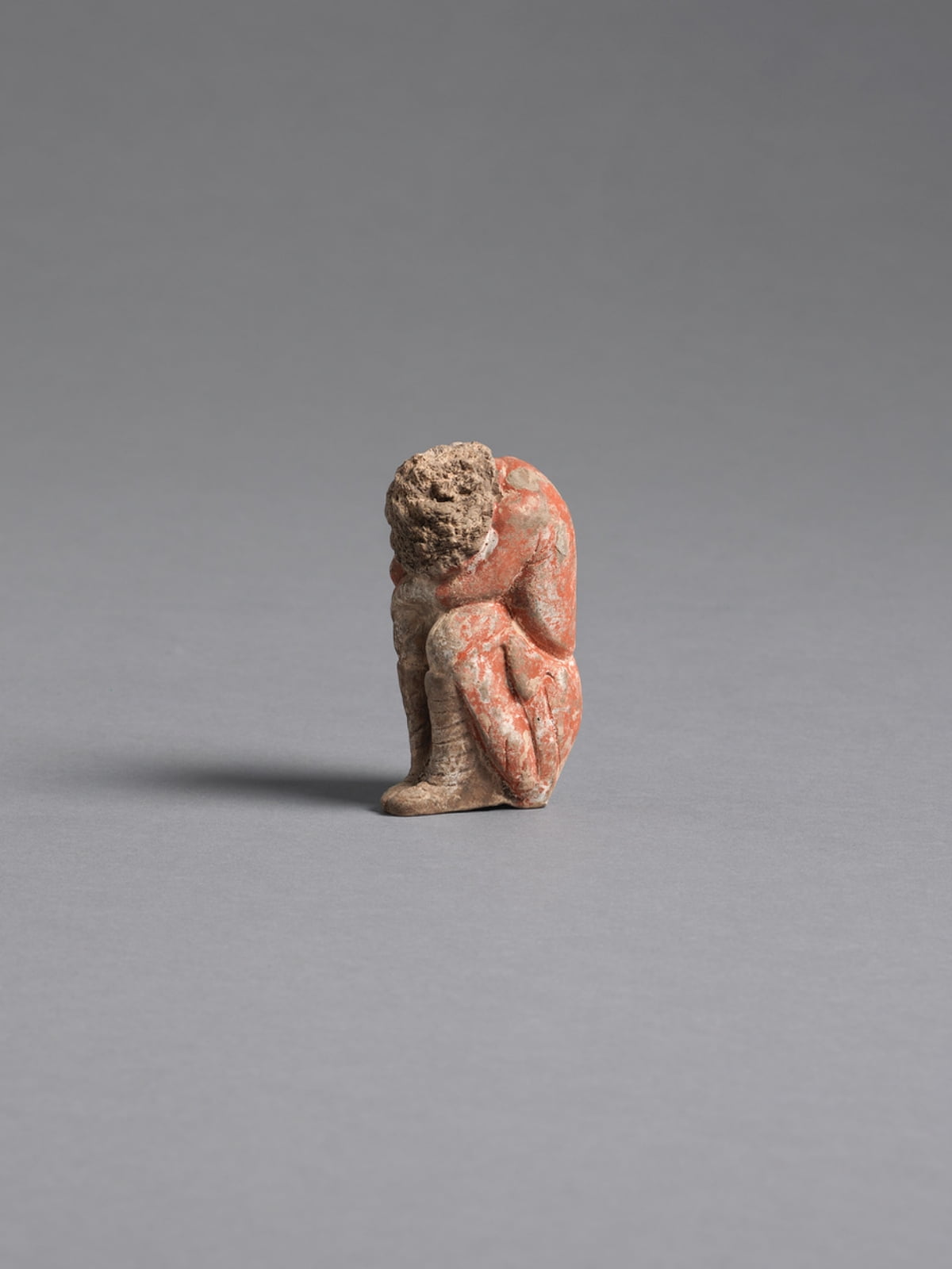 5. Painted Earthenware Sleeping Youth