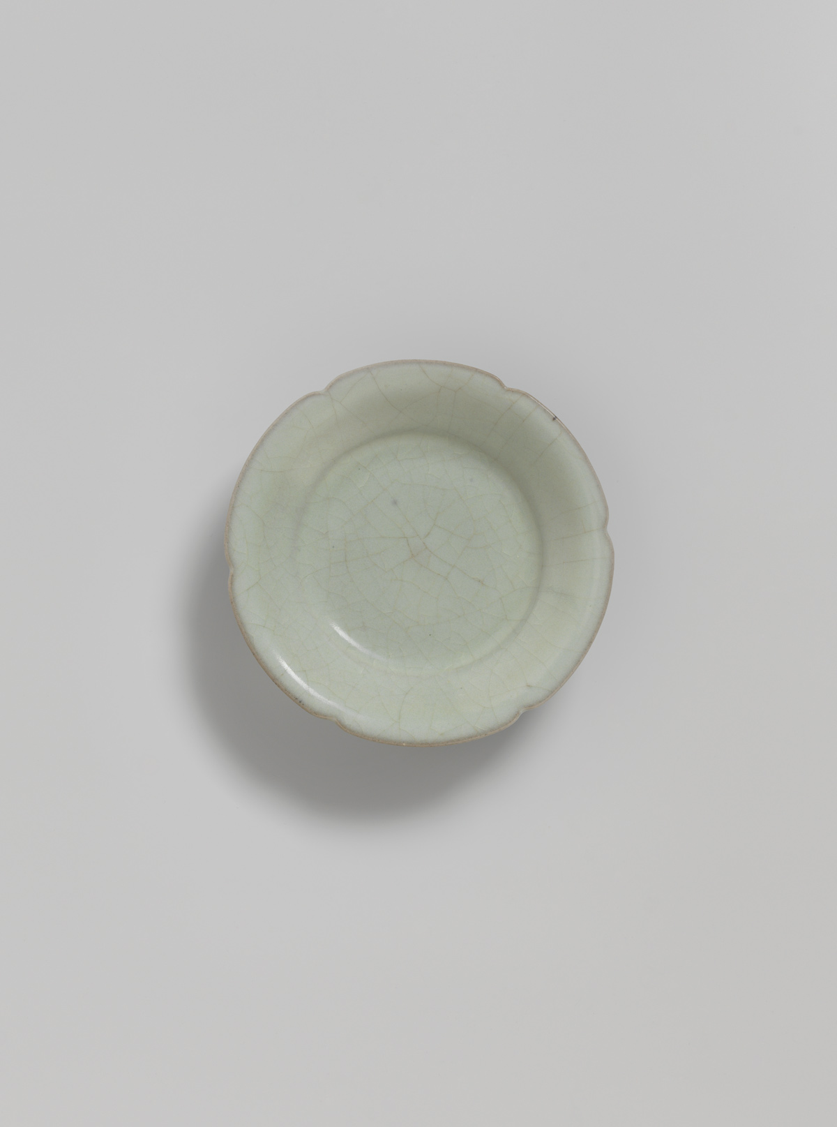 Green-grey-glazed stoneware dish