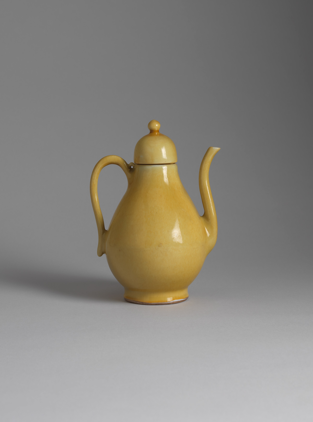 Yellow-glazed porcelain ewer and cover