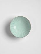 Glazed stoneware bowl with foliate rim